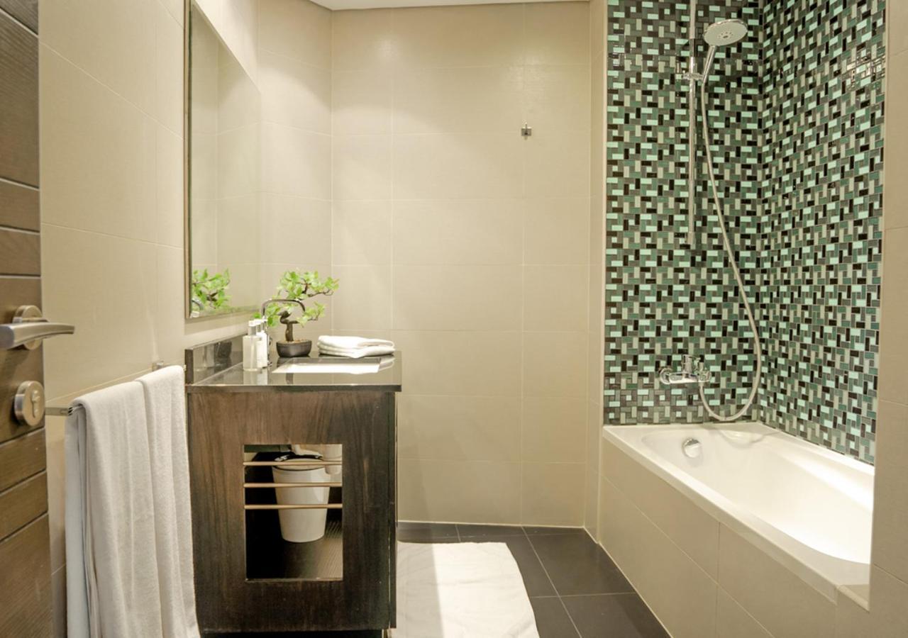Nasma Luxury Stays - Cayan Tower Dubai Buitenkant foto