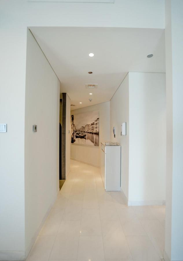 Nasma Luxury Stays - Cayan Tower Dubai Buitenkant foto