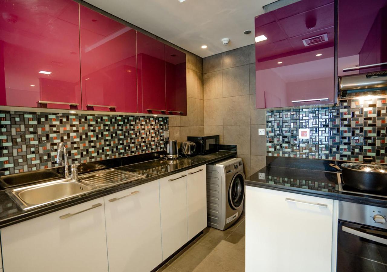 Nasma Luxury Stays - Cayan Tower Dubai Buitenkant foto