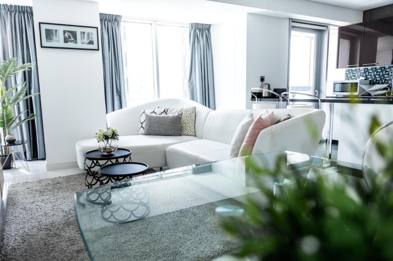 Nasma Luxury Stays - Cayan Tower Dubai Buitenkant foto