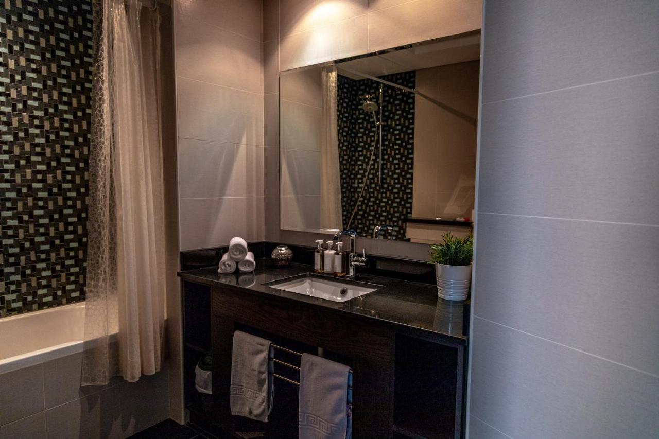 Nasma Luxury Stays - Cayan Tower Dubai Buitenkant foto